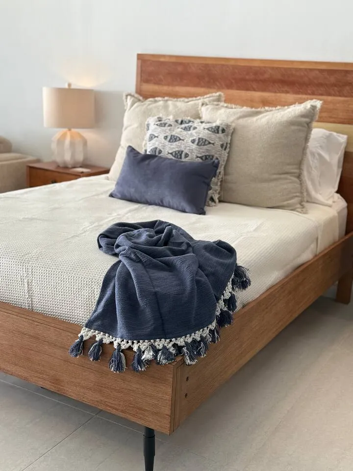 Comfortable queen bed at Reef Studio