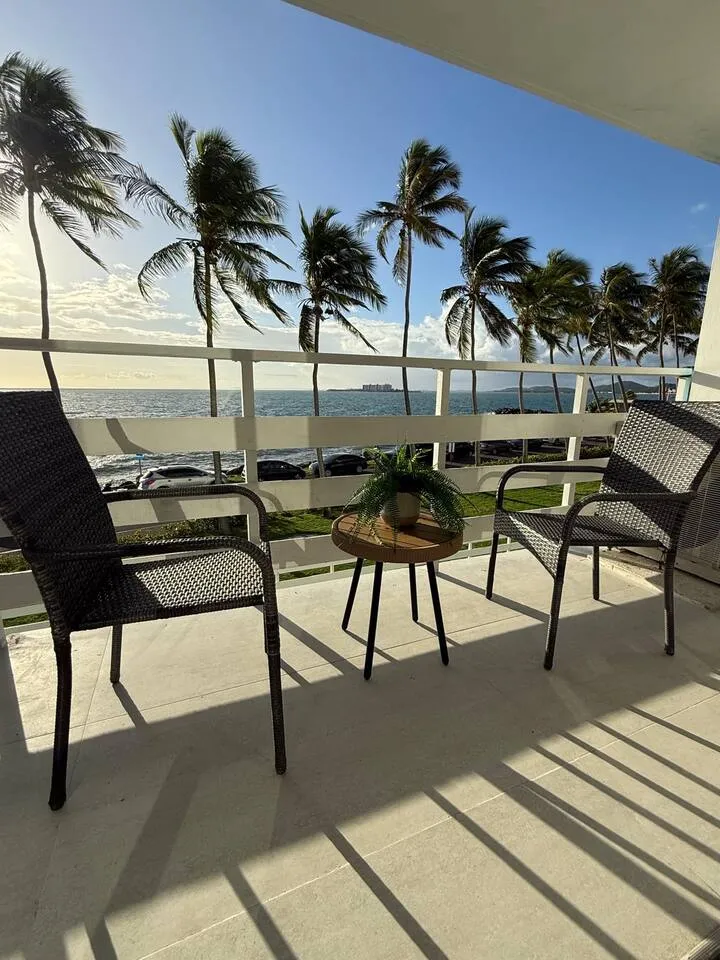 Oceanfront balcony, morning coffee with wave sounds at Reef Studio
